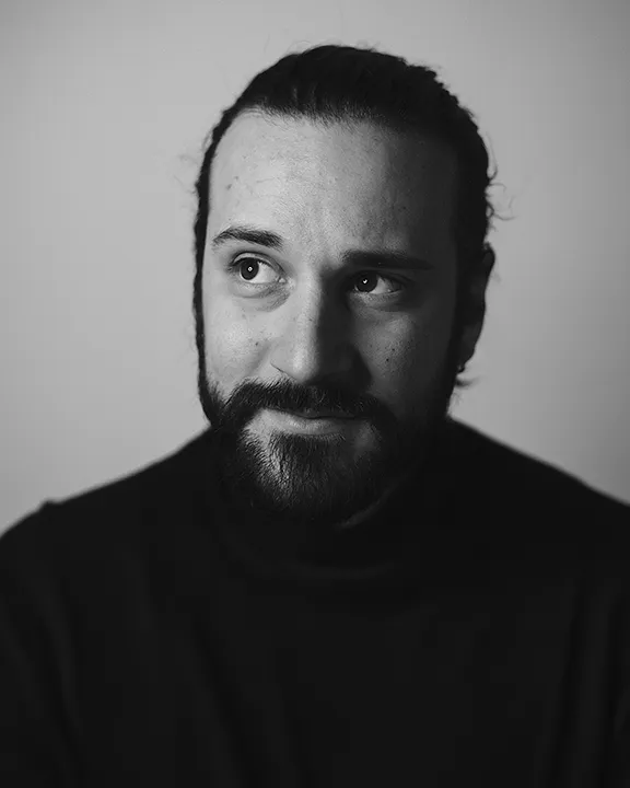 Ritratto del docente Alberto Monassaro.